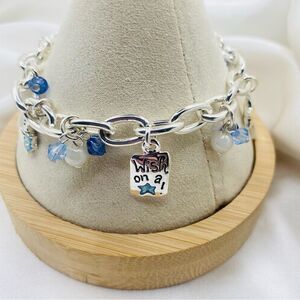 adorable charm bracelet is perfect for adding a touch of whimsy to any outfit